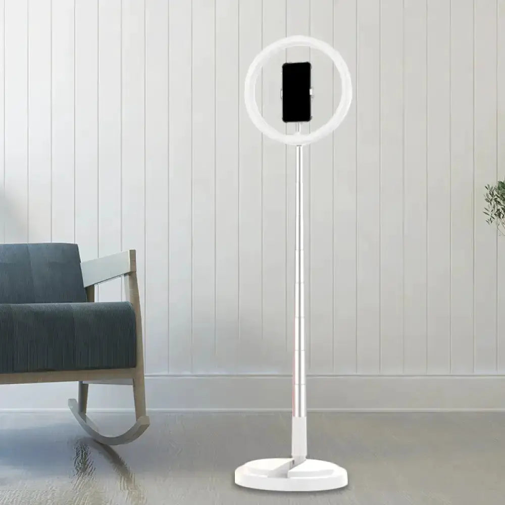 Decorbites metallic black LED makeup lamp with phone holder on tall metal stand in modern bedroom on Tampa Home & Garden Store