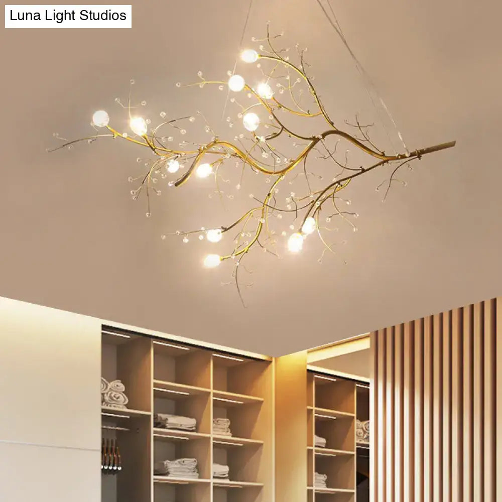 Gold metallic branch crystal bead chandelier by Decorbites with warm LED lights on Tampa Home & Garden Store