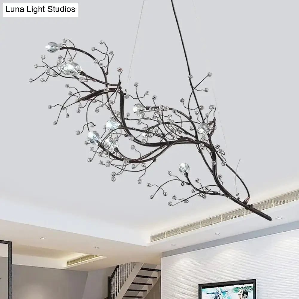 Gold metallic branch crystal bead chandelier with twisting metal branches and crystal beads on Tampa Home & Garden Store