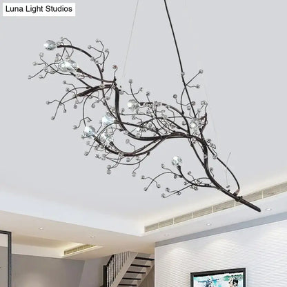 Gold metallic branch crystal bead chandelier with twisting metal branches and crystal beads on Tampa Home & Garden Store