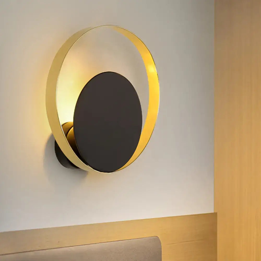 Black Gold Circle Sconce by Decorbites; wall-mounted gold ring with black center on Tampa Home & Garden Store