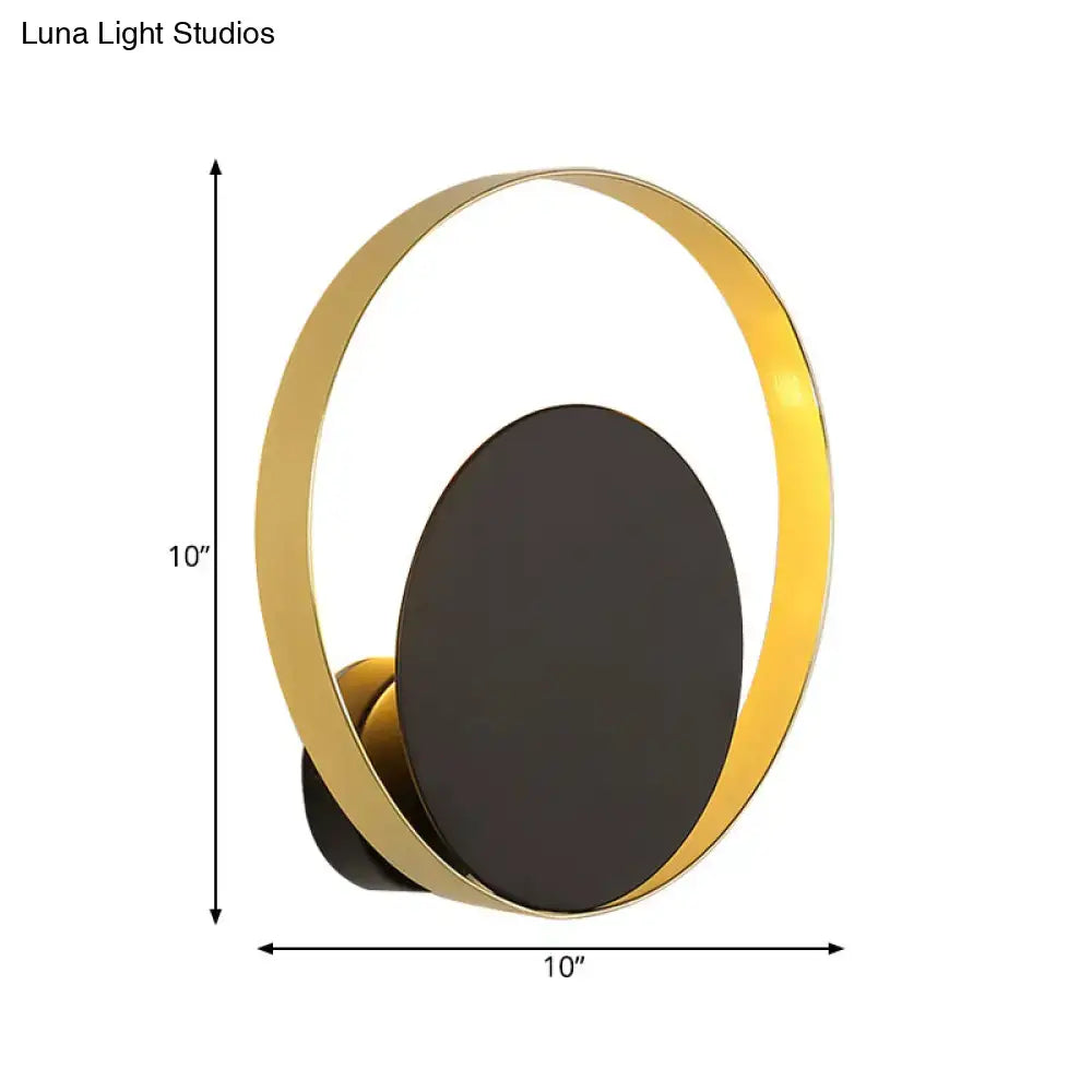 Decorbites Black Gold Circle Sconce with gold ring and black center on Tampa Home & Garden Store