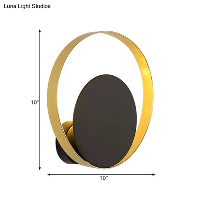 Decorbites Black Gold Circle Sconce with gold ring and black center on Tampa Home & Garden Store