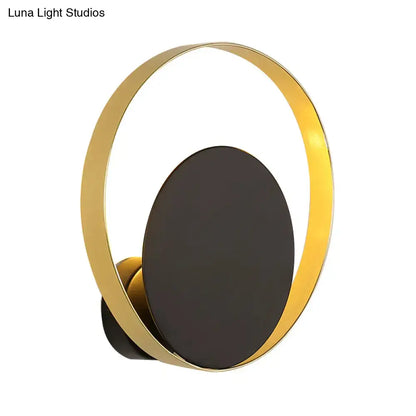 Black Gold Circle Sconce with gold ring around a matte black backplate, modern wall light on Tampa Home & Garden Store