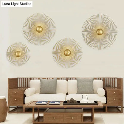 Set of four mid century brass sunburst wall sconces above a sofa in a bright living room Decorbites on Tampa Home & Garden Store