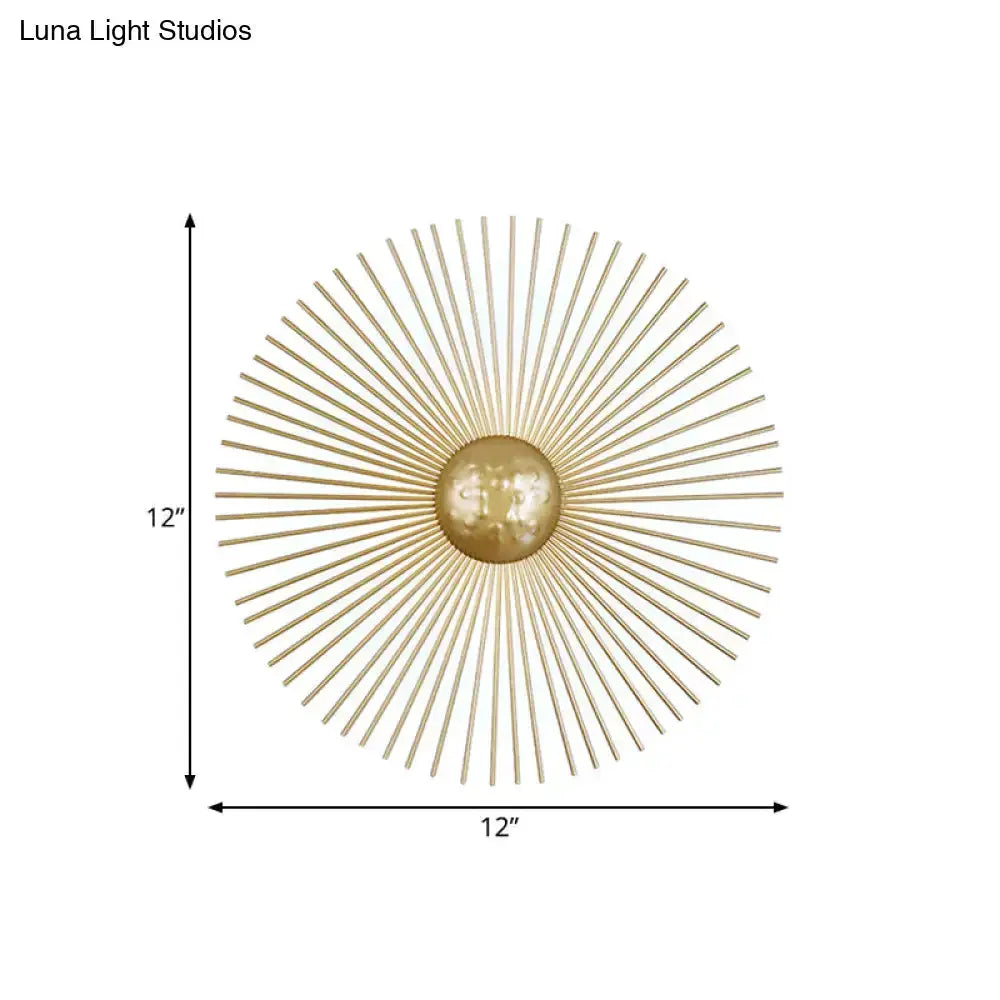 Decorbites mid-century brass sunburst sconce wall light with radiating spokes on Tampa Home & Garden Store