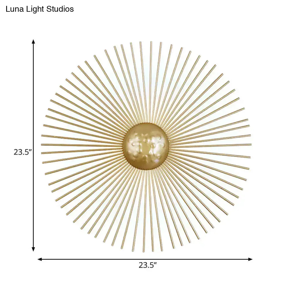 Mid-century brass sunburst sconce wall light with radial spokes on Tampa Home & Garden Store