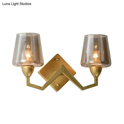 Decorbites mid-century brass two-light wall lamp with truncated cone glass shades on Tampa Home & Garden Store