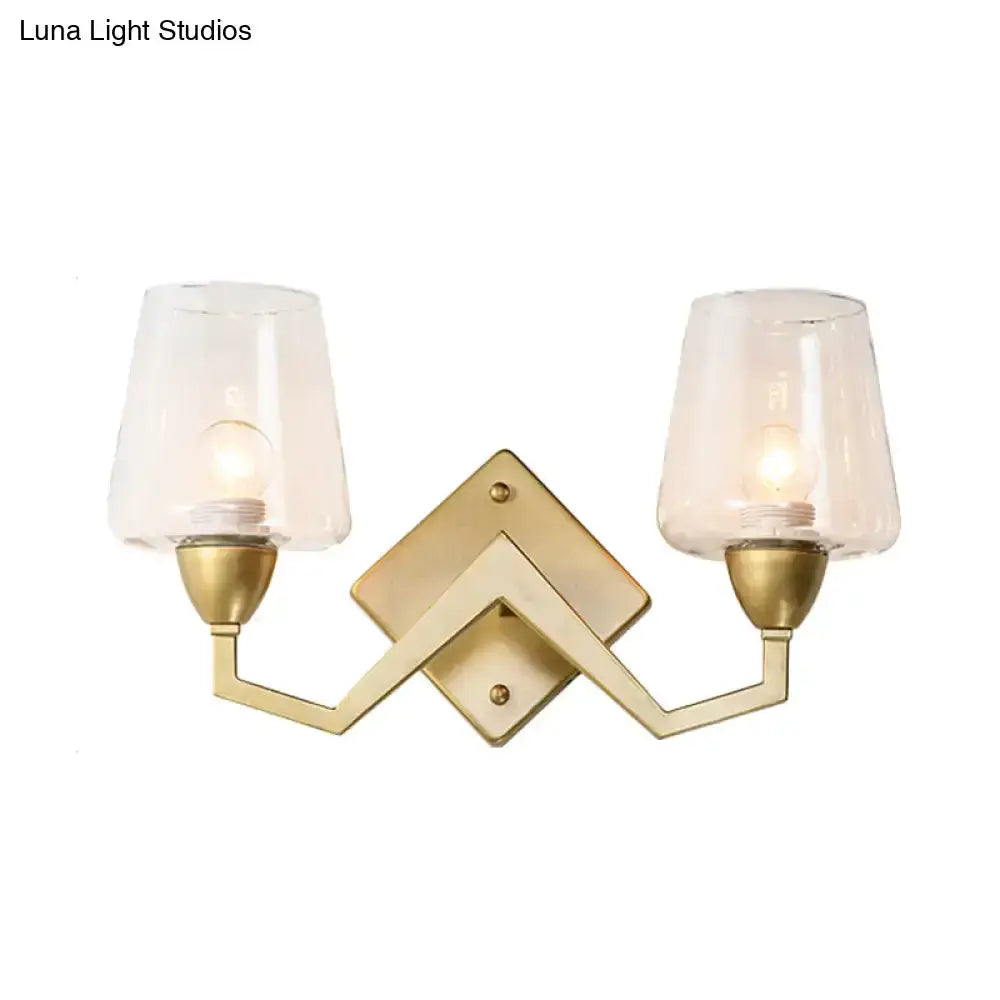 Decorbites mid-century brass wall lamp, two-light sconce with clear truncated cone glass shades on Tampa Home & Garden Store