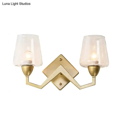 Decorbites mid-century brass wall lamp, two-light sconce with clear truncated cone glass shades on Tampa Home & Garden Store