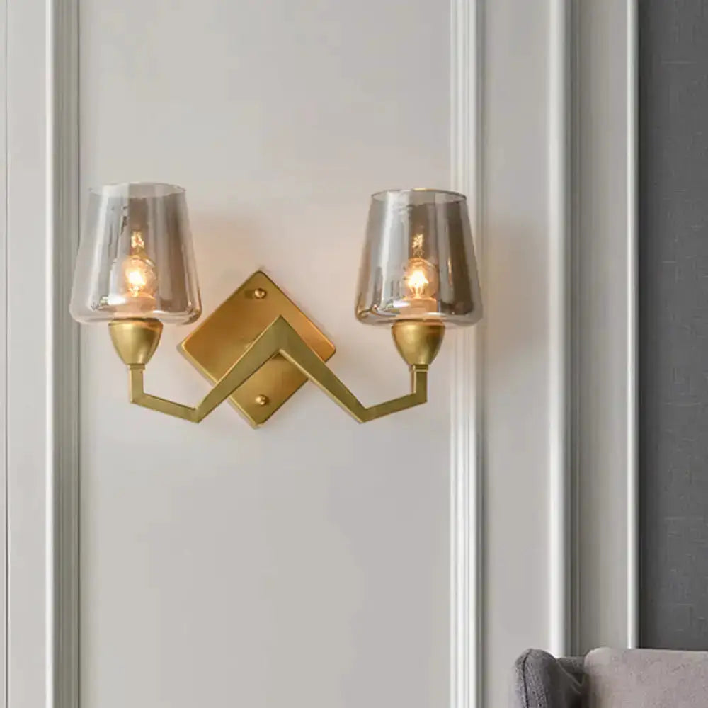 Decorbites two-light mid-century brass wall lamp with truncated cone glass shades on Tampa Home & Garden Store