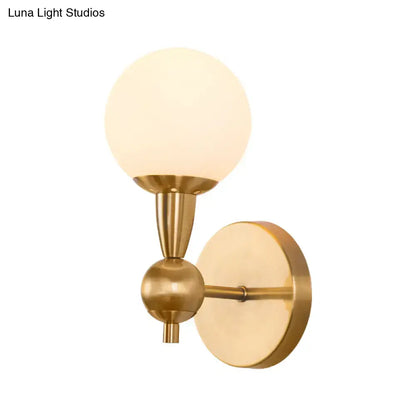 Brass opal glass orb wall sconce, wall-mounted with frosted globe, Decorbites on Tampa Home & Garden Store
