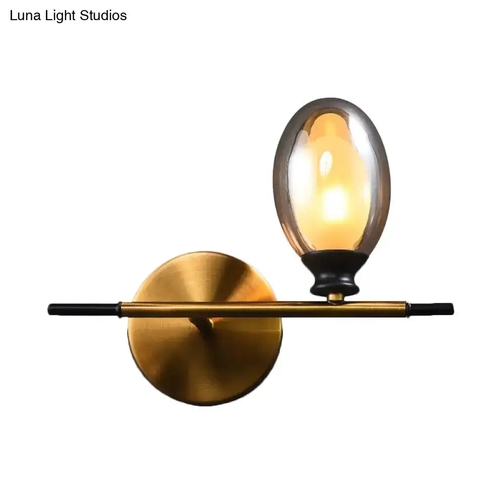 Mid Century Gold and Black Wall Lamp Amber Shade