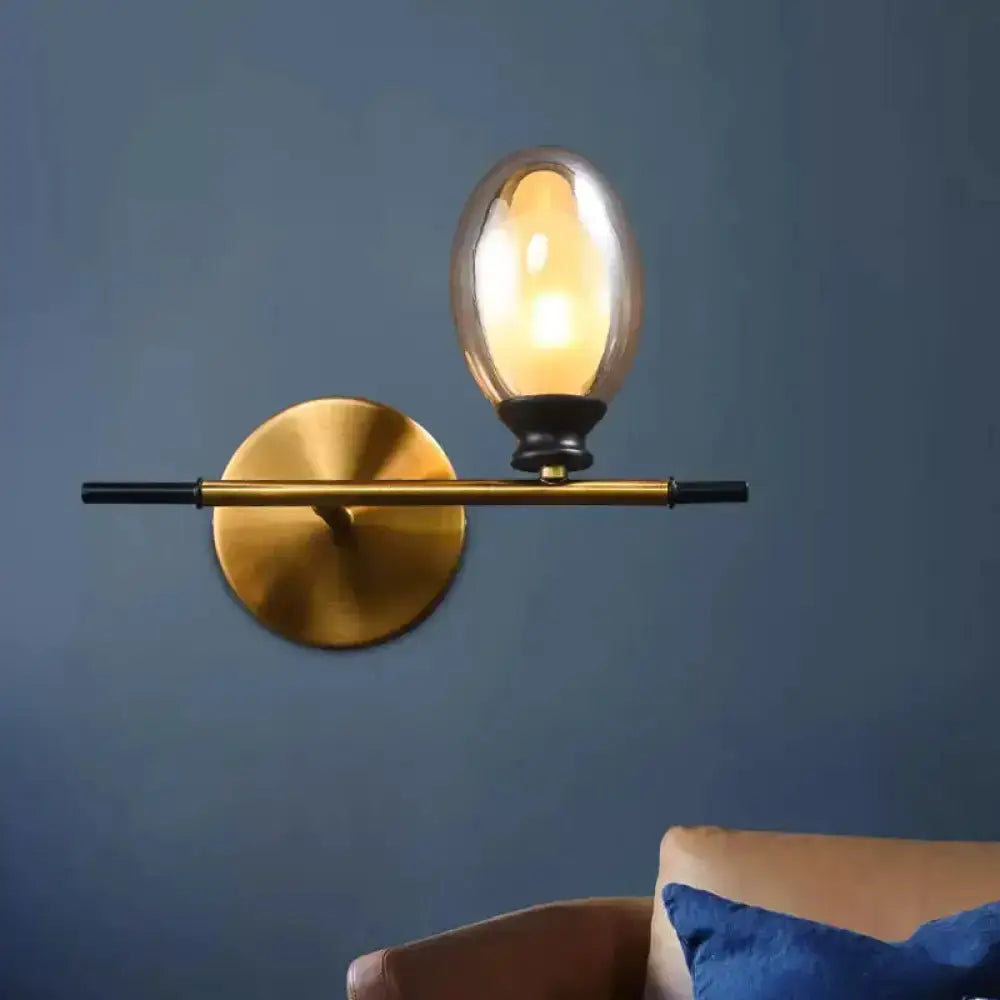 Mid Century Gold and Black Wall Lamp Amber Shade