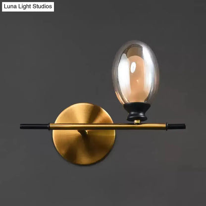 Mid Century Gold and Black Wall Lamp Amber Shade