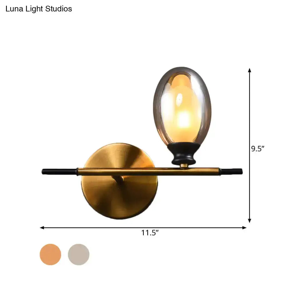 Mid Century Gold and Black Wall Lamp Amber Shade