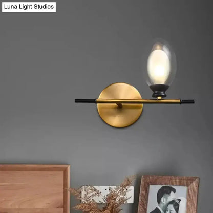 Mid Century Gold and Black Wall Lamp Amber Shade