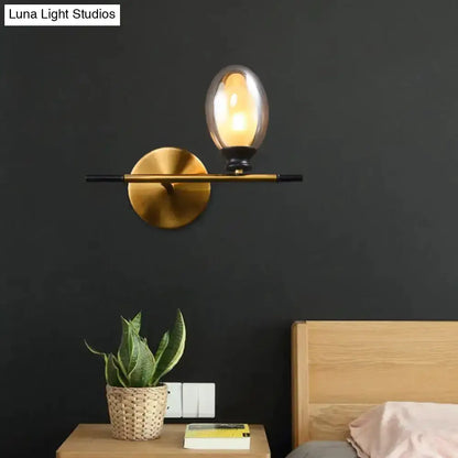 Mid Century Gold and Black Wall Lamp Amber Shade