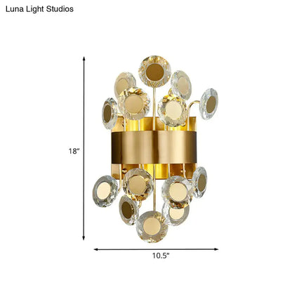 Decorbites gold crystal integrated LED wall light sconce with round crystal discs on a gold band on Tampa Home & Garden Store