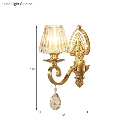 Mid century gold crystal wall sconce with glass shade and hanging drop LED on Tampa Home & Garden Store
