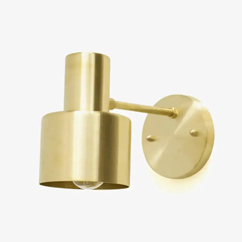 Mid-century brass cage wall sconce with gold finish on Tampa Home & Garden Store