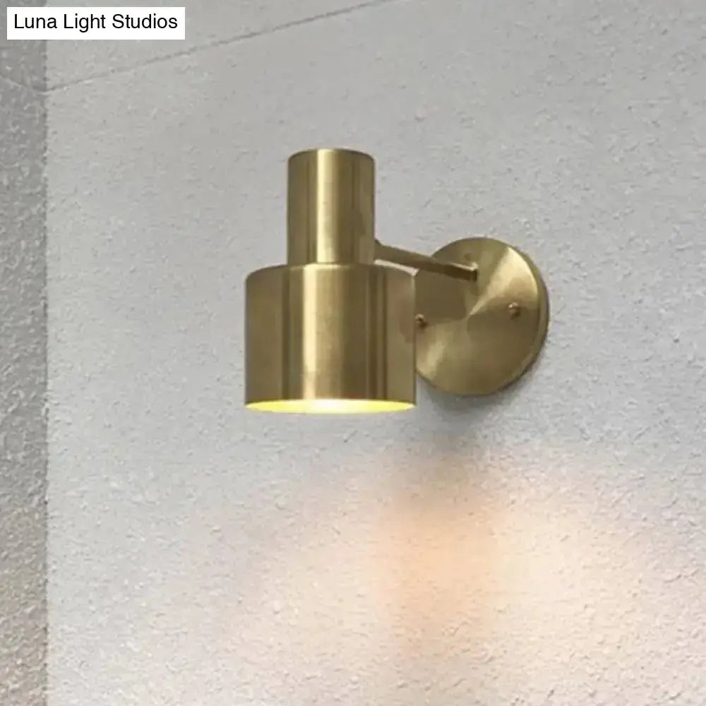 Mid-century gold metal cage wall sconce by Decorbites with round backplate on Tampa Home & Garden Store