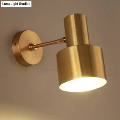 Mid-century gold metal wall sconce with cylindrical shade for bedroom Decorbites on Tampa Home & Garden Store