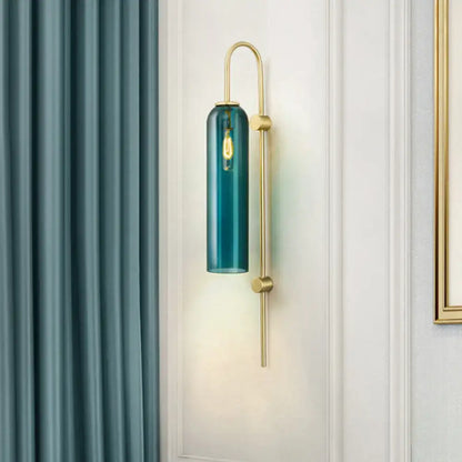 Brass teal glass gooseneck wall sconce with cylindrical shade, single fixture on Tampa Home & Garden Store