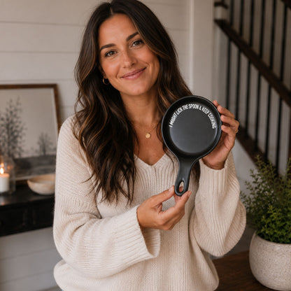 Lick the Spoon & Cook spoon rest by Gia Roma, black circular dish with white text on rim on Tampa Home & Garden Store