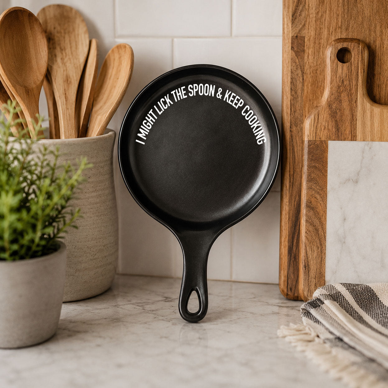 Lick the Spoon & Cook spoon rest, Gia Roma, black skillet-style with white text on Tampa Home & Garden Store