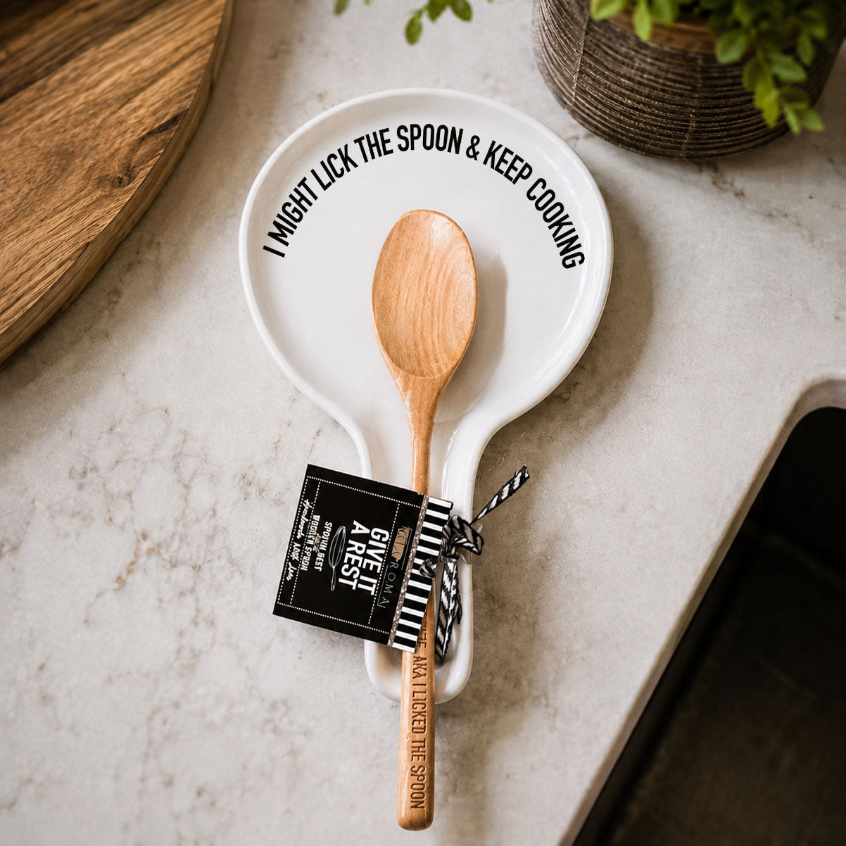 Lick the Spoon & Cook spoon rest by Gia Roma, white ceramic with curved rim on counter on Tampa Home & Garden Store