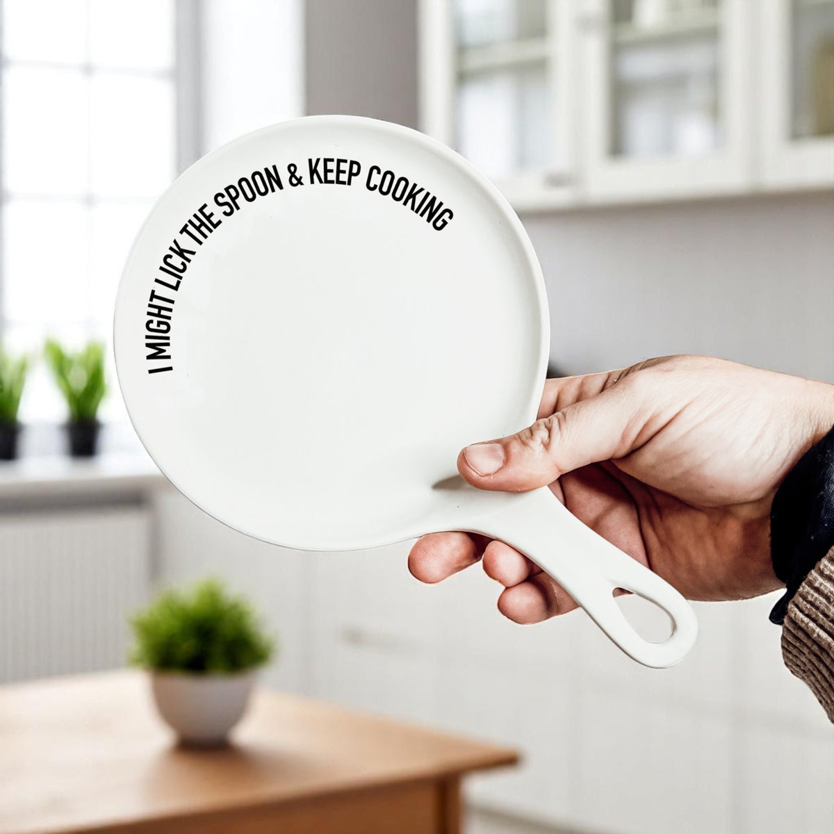 Lick the Spoon & Cook spoon rest by Gia Roma, white ceramic with black script along rim on Tampa Home & Garden Store