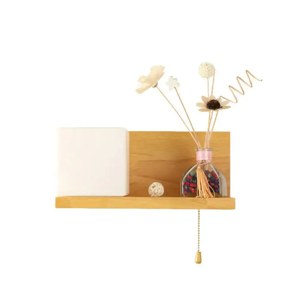 Milk Glass Cube Sconce on a wooden shelf with white cube block and dried flower bottle on Tampa Home & Garden Store