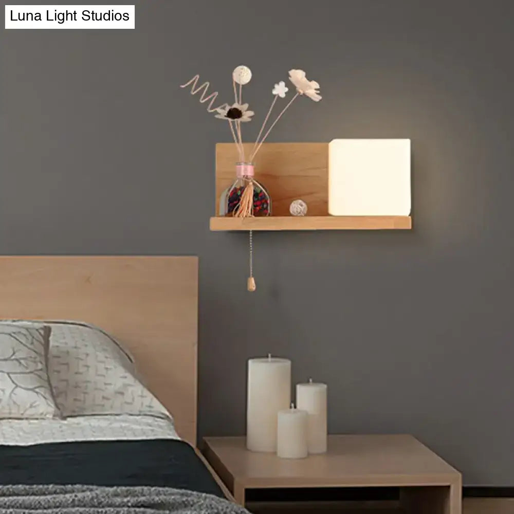 Milk Glass Cube Sconce by Decorbites on a wooden wall shelf with pull-chain on Tampa Home & Garden Store