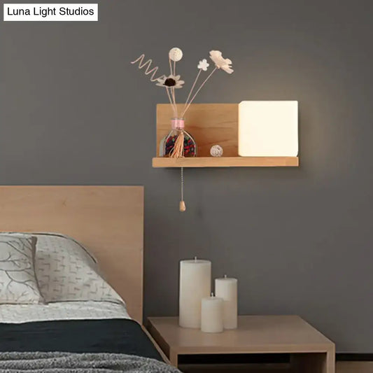 Milk Glass Cube Sconce by Decorbites on a wooden wall shelf with pull-chain on Tampa Home & Garden Store