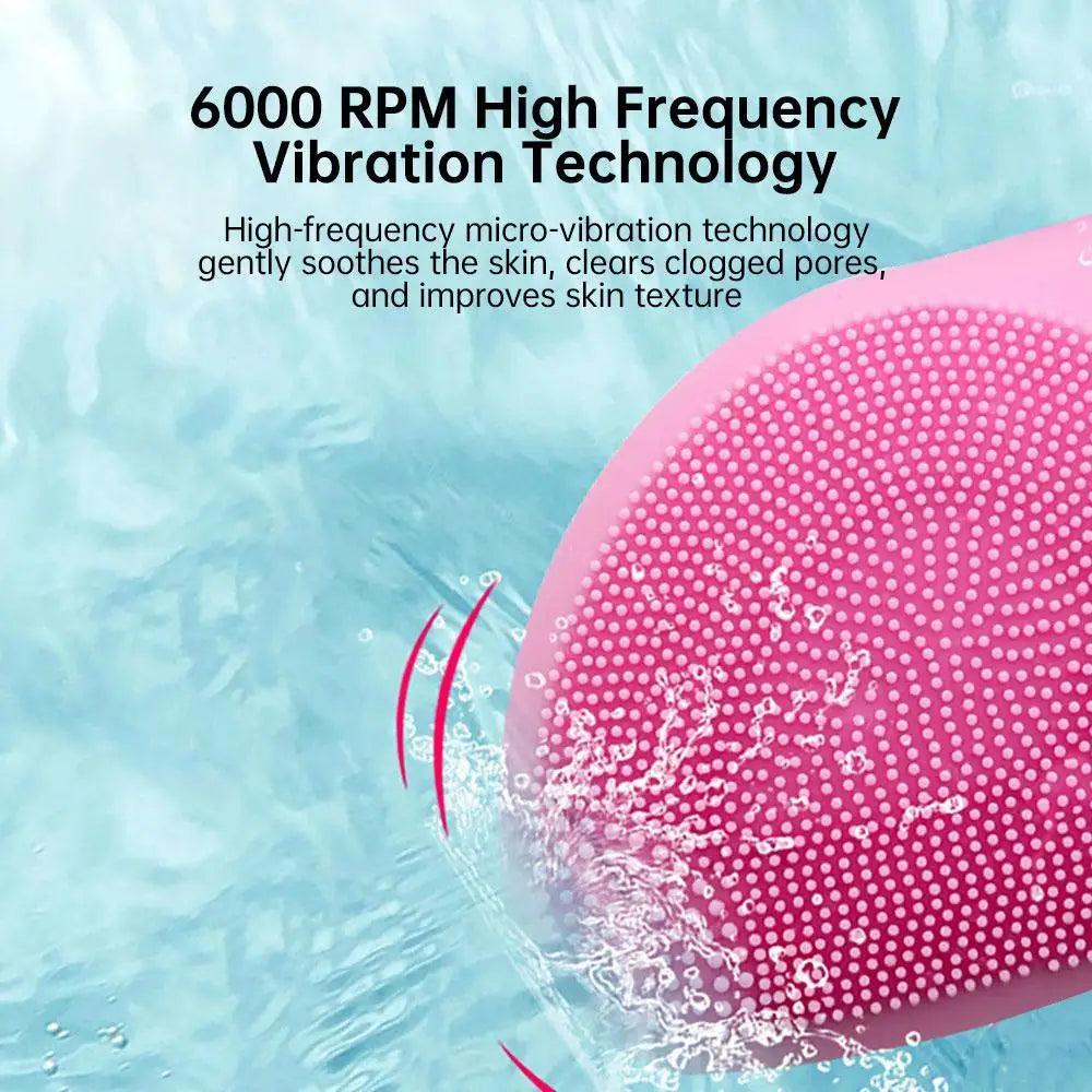 Stevvex mini electric silicone facial cleansing brush pink with dense bristles and water splash on Tampa Home & Garden Store