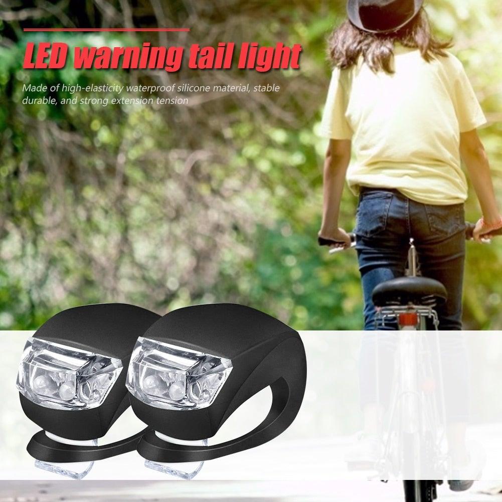 Waterproof silicone bike front and rear lights pair by Stevvex, black housing with clear lens on Tampa Home & Garden Store