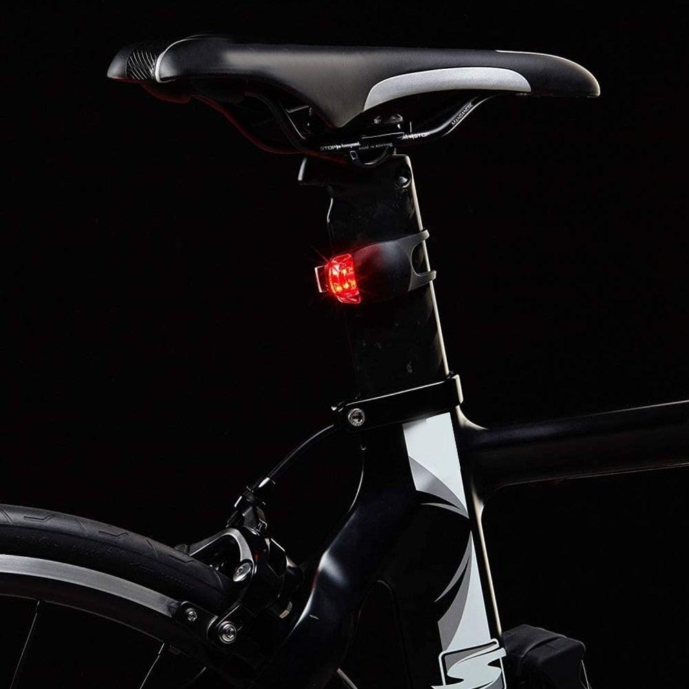 Stevvex waterproof silicone bike rear light mounted on seat post with red LED on black frame on Tampa Home & Garden Store