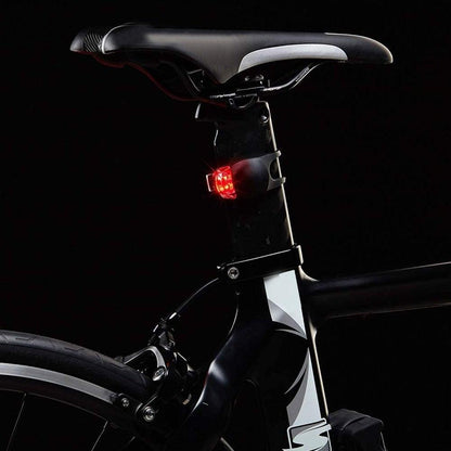 Stevvex waterproof silicone bike rear light mounted on seat post with red LED on black frame on Tampa Home & Garden Store