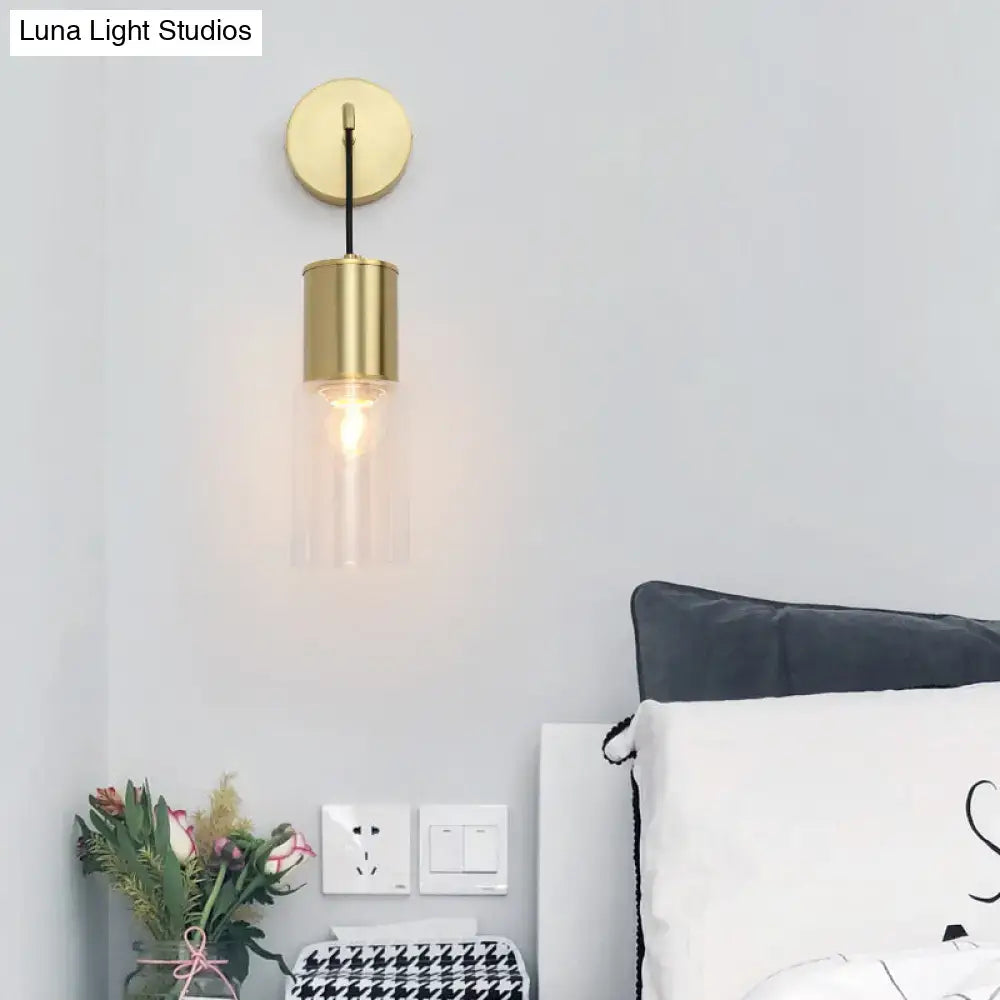 Brass glass wall sconce curved arm design by Decorbites clear glass shade on Tampa Home & Garden Store