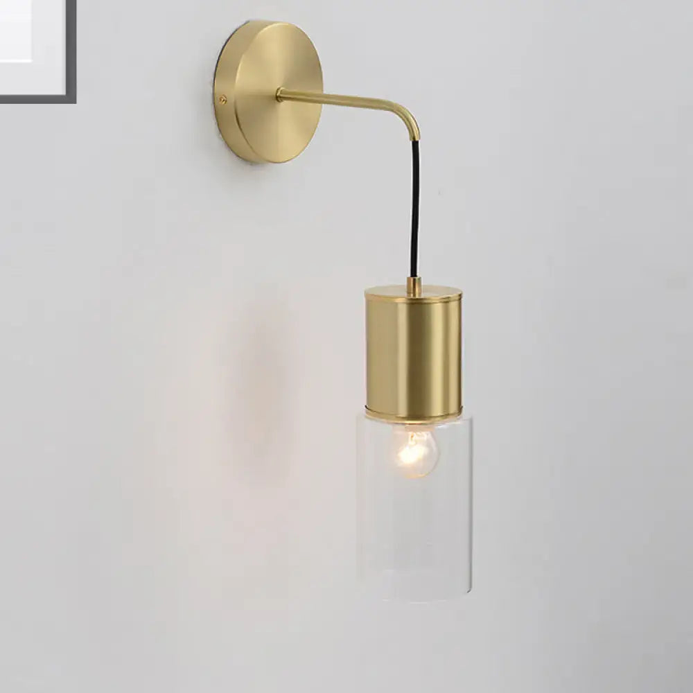Brass Glass Wall Sconce with curved arm and clear glass shade Decorbites on Tampa Home & Garden Store