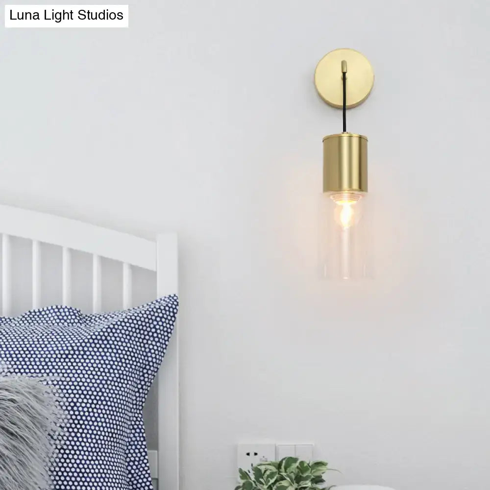 Brass glass wall sconce with curved arm for bedrooms on Tampa Home & Garden Store
