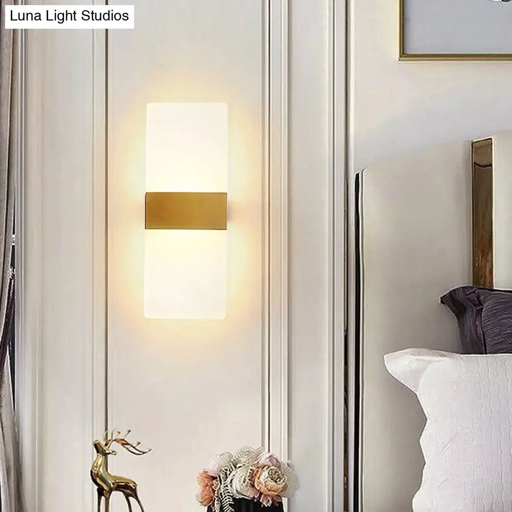Gold acrylic direct-wired wall sconce by Decorbites, frosted white shade with brass bar on Tampa Home & Garden Store