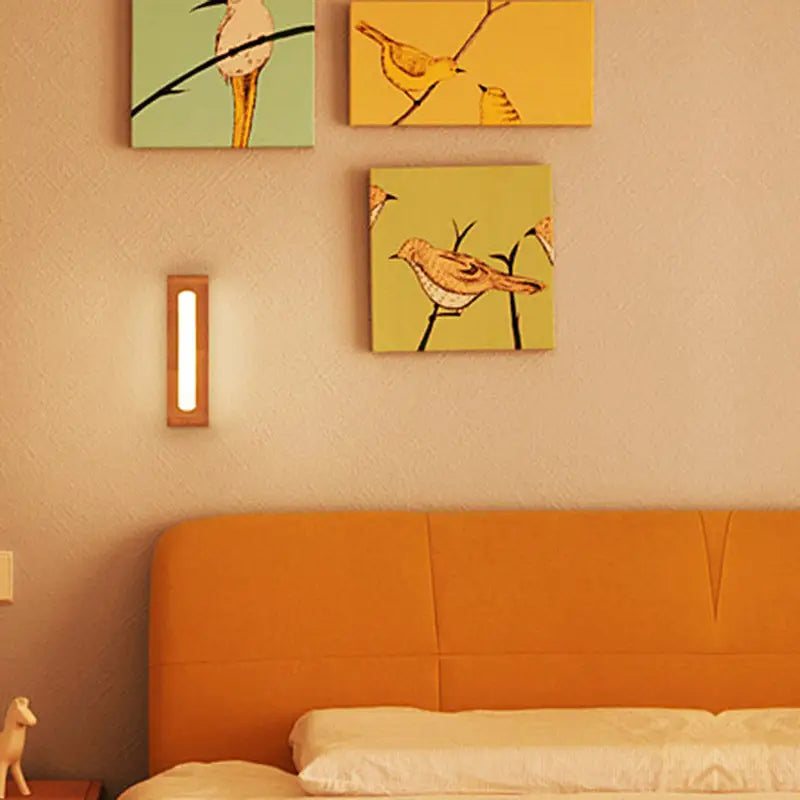 Minimalist bamboo LED wall sconce with wooden strip warm glow Decorbites lighting on Tampa Home & Garden Store