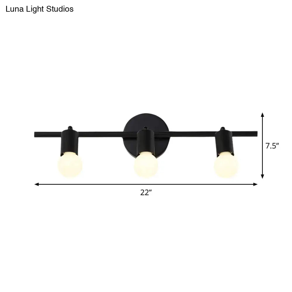 Black metal 3-arm vanity light fixture with round backplate and three warm bulbs on Tampa Home & Garden Store