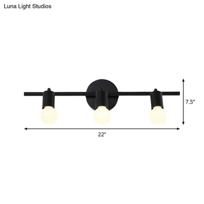Black metal 3-arm vanity light fixture with round backplate and three warm bulbs on Tampa Home & Garden Store