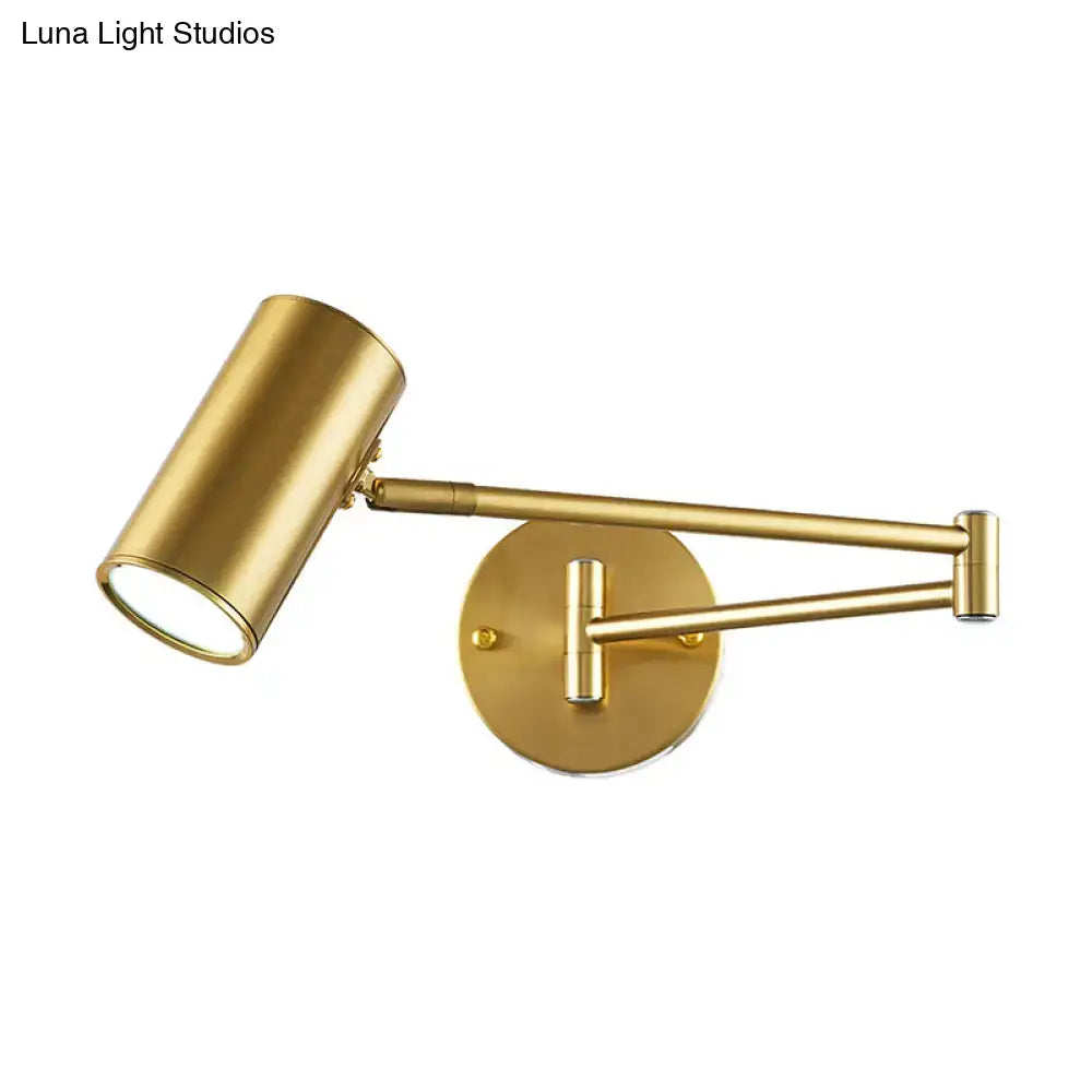 Black Gold Cylinder Wall Light with brass finish and adjustable swing arm on Tampa Home & Garden Store