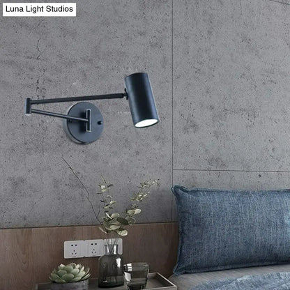Black gold cylinder wall light by Decorbites, black metal with adjustable arm on wall mount on Tampa Home & Garden Store