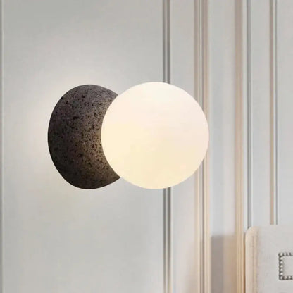 Black Glass Minimalist LED Wall Sconce with white frosted globe and black backplate on Tampa Home & Garden Store