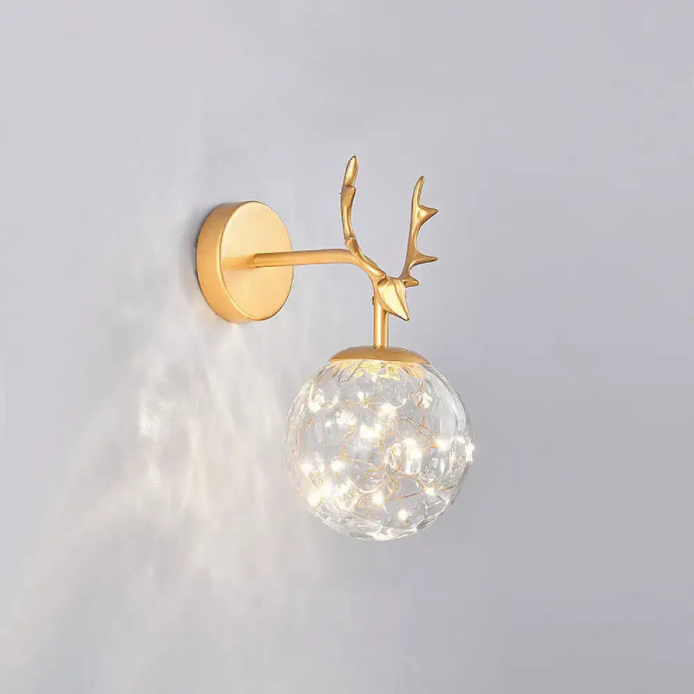 Antler glass sconce wall light with gold-tone finish and crystal globe Decorbites on Tampa Home & Garden Store